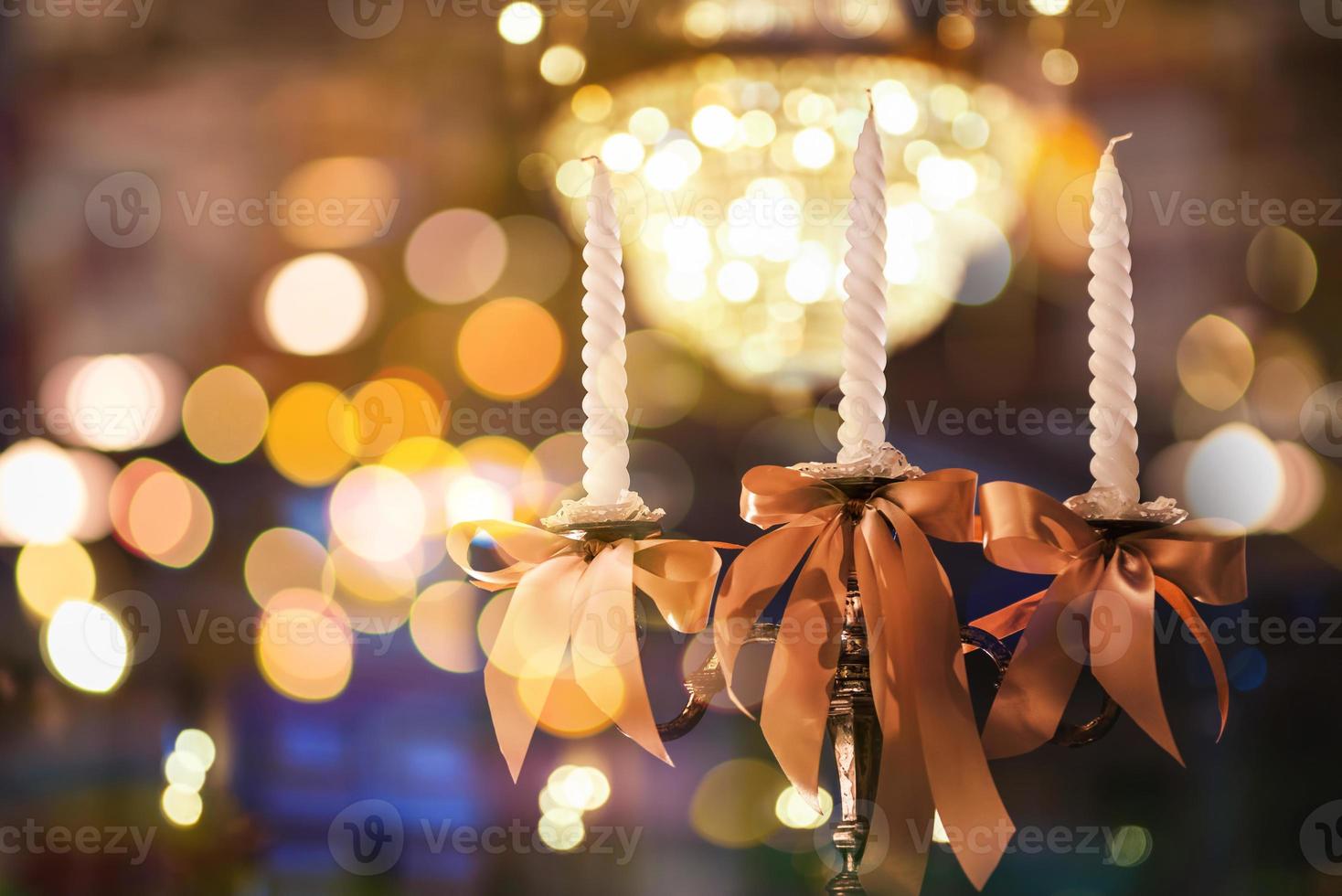 candlesticks with candles in ballroom photo