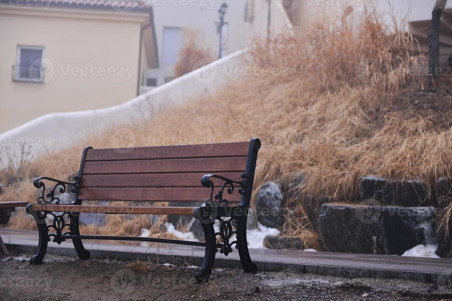 empty bench in the winter photo
