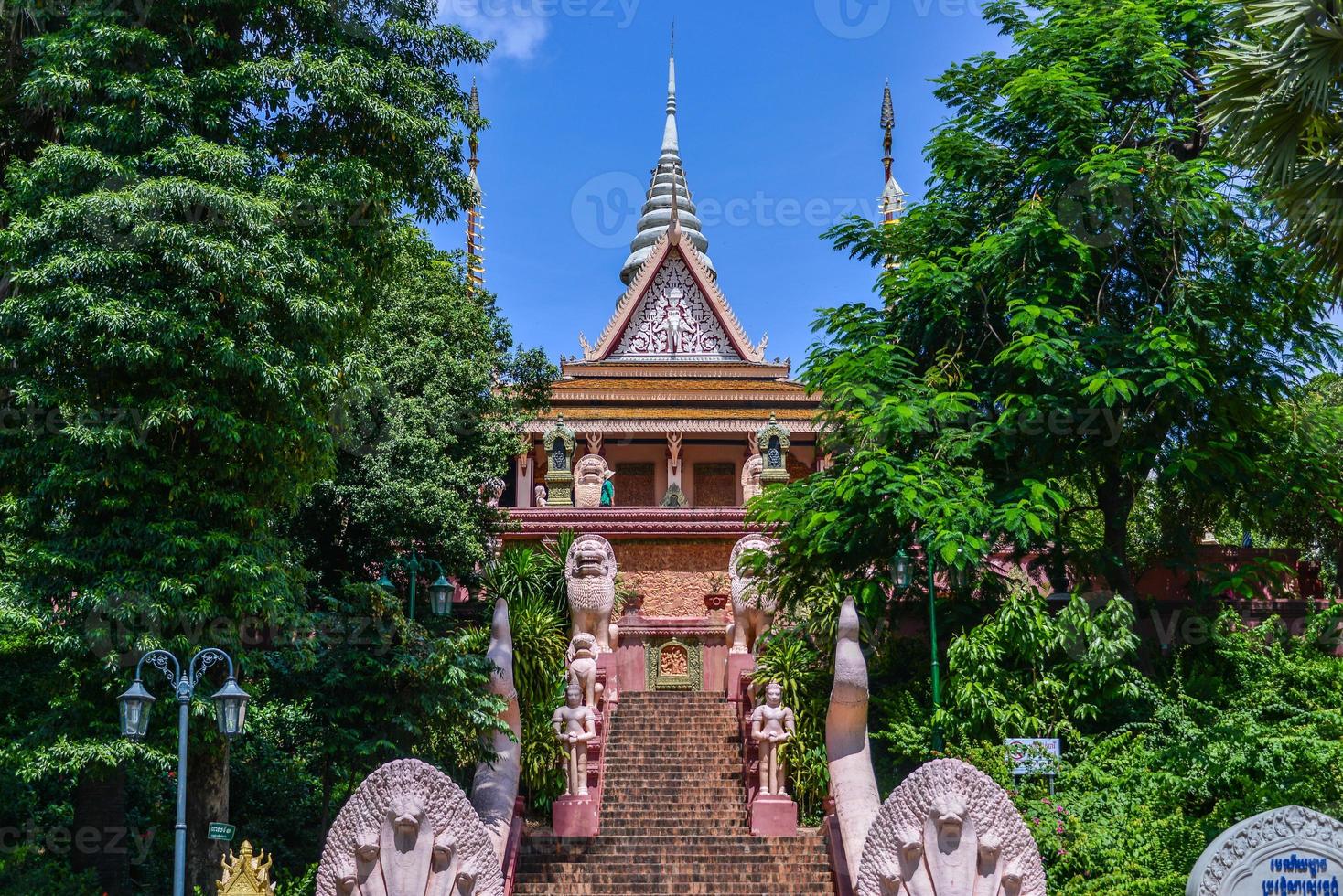 Wat Phnom is a Buddhist temple located in Phnom Penh, Cambodia. It is the tallest religious structure in the city. photo