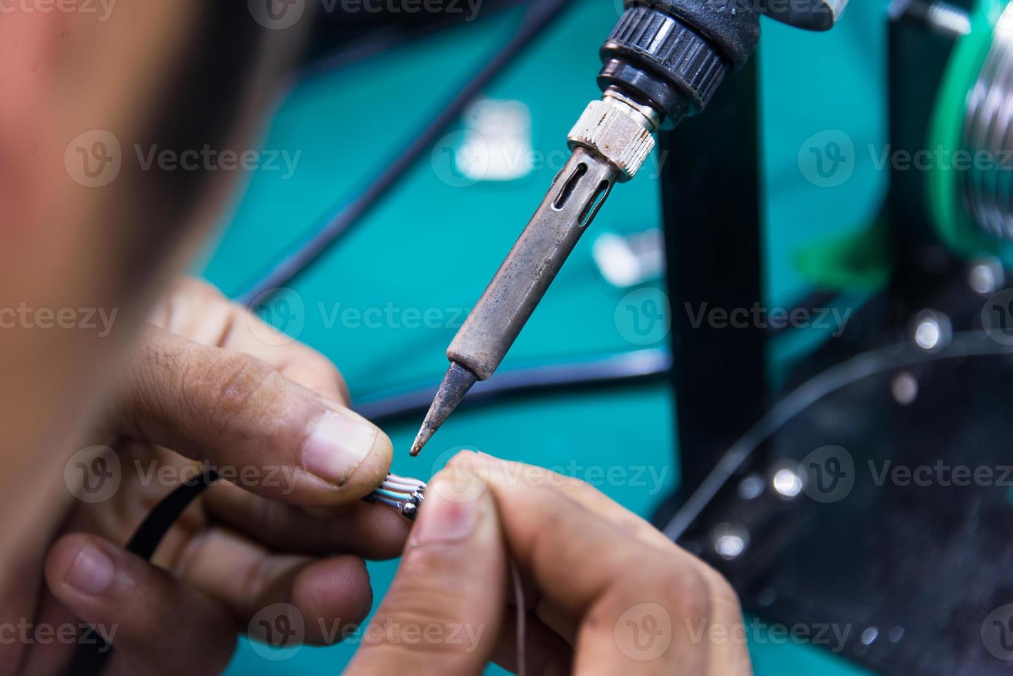 working is soldering cable photo