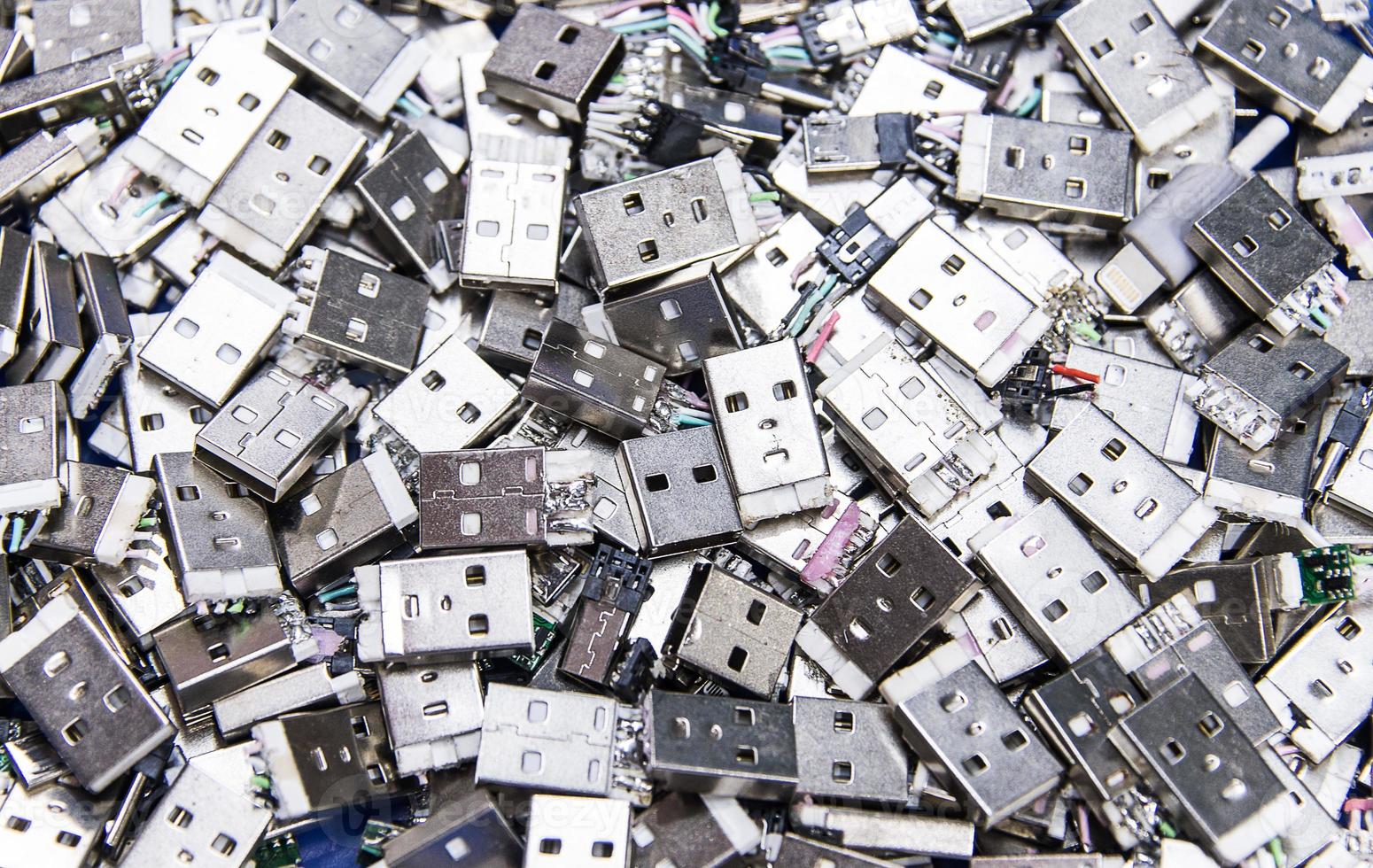 A pile of broken usb and micro usb photo