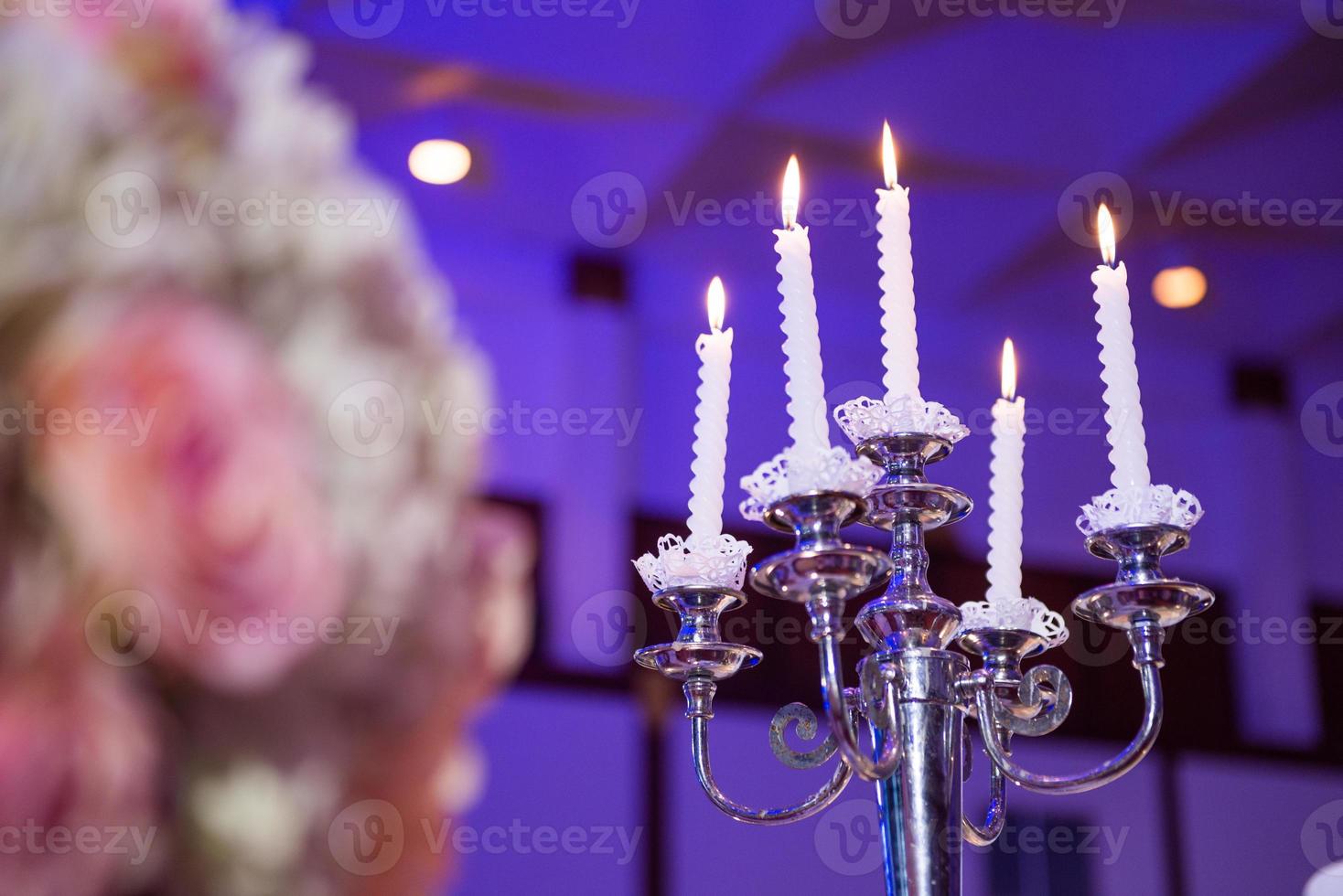 candlesticks with candles in ballroom photo