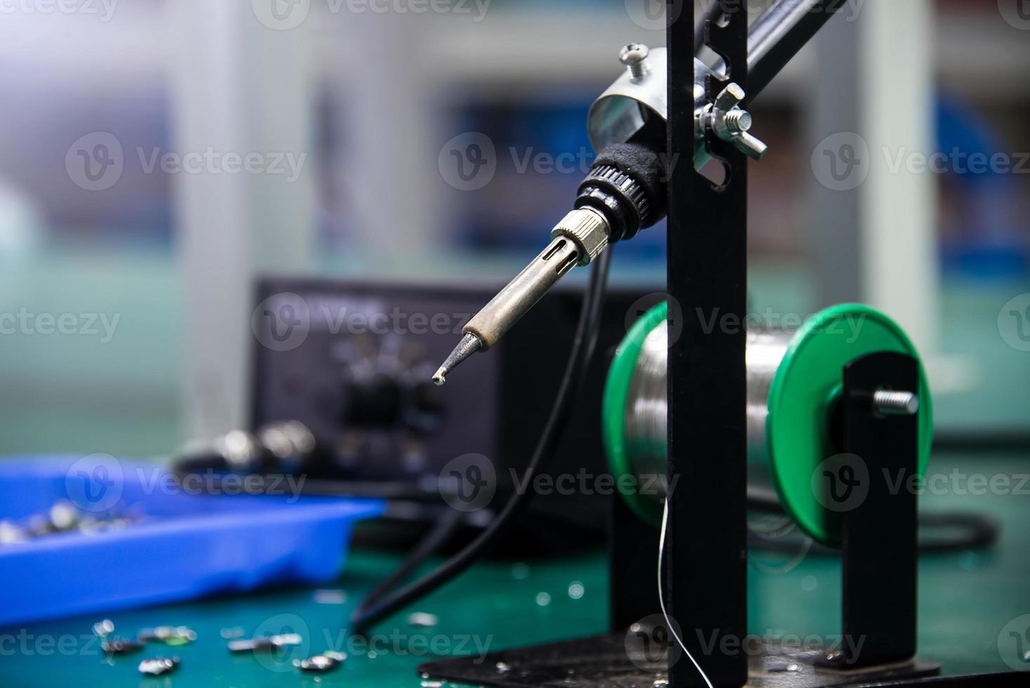 soldering iron and tin string photo