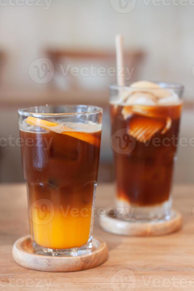Glass of americano mixed with orange juice photo