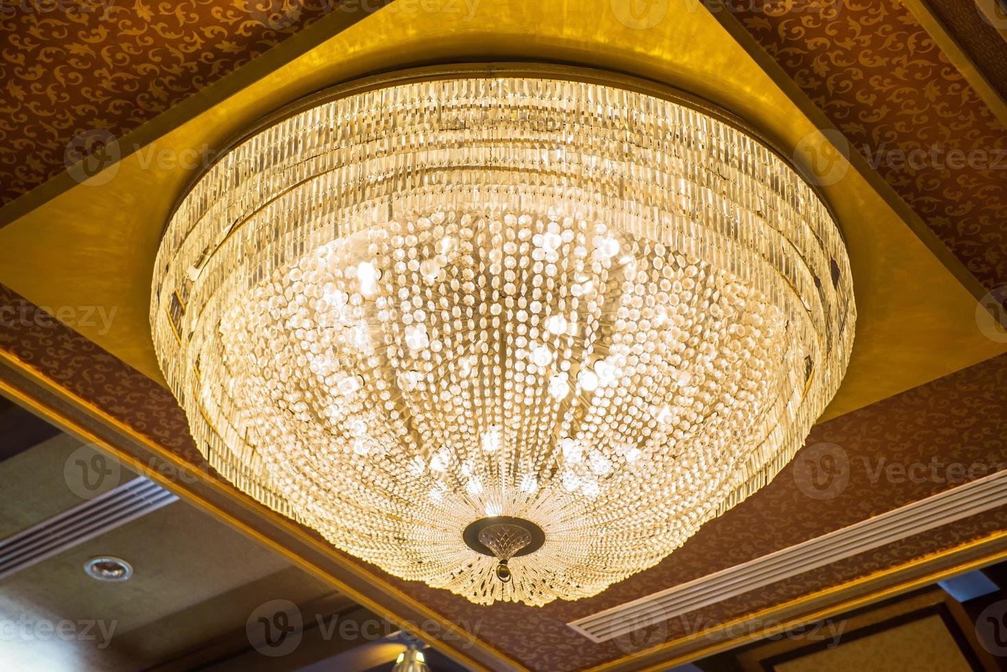 beautiful crystal chandelier in ball room photo