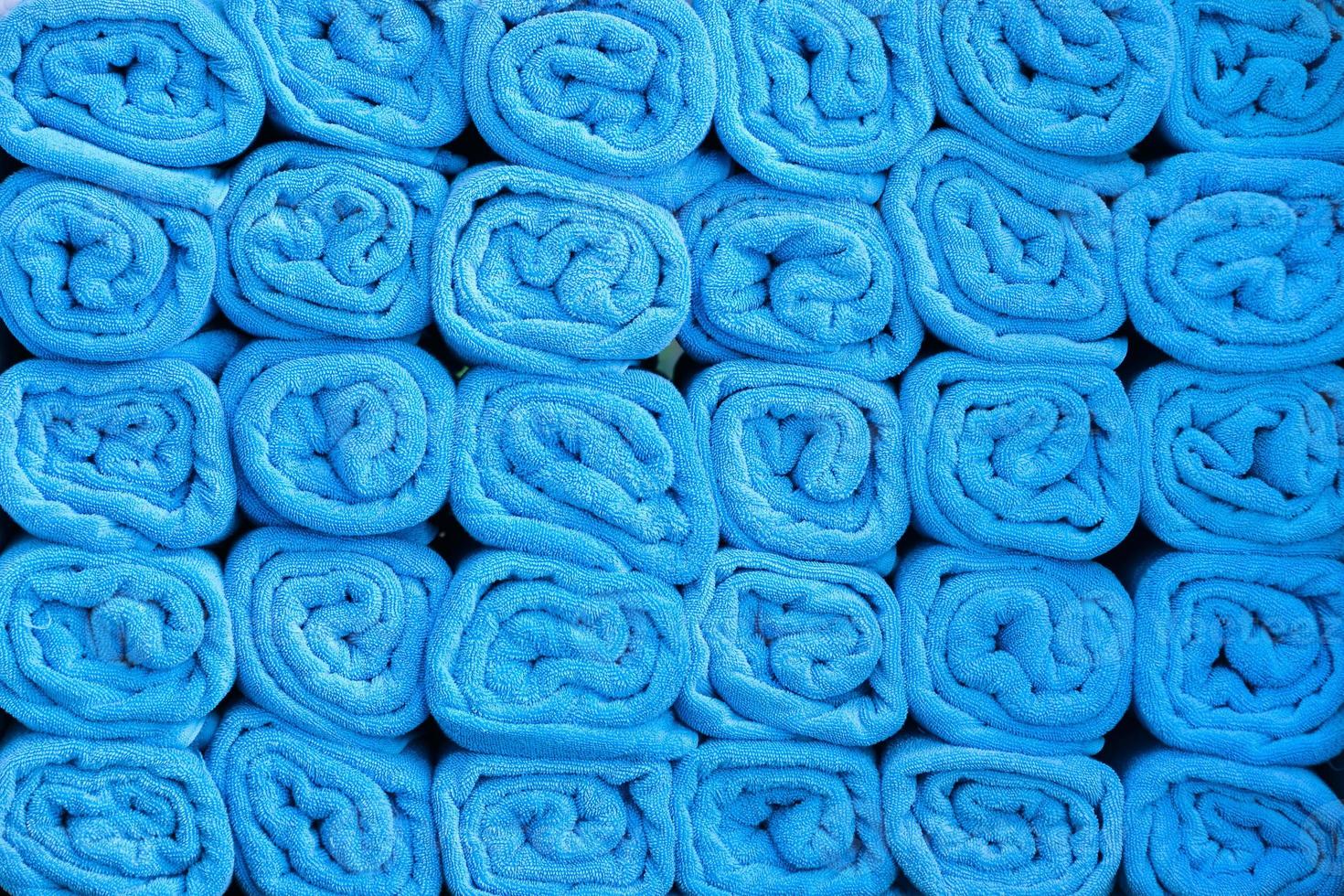 a pile of Blue towel arranging in layer photo