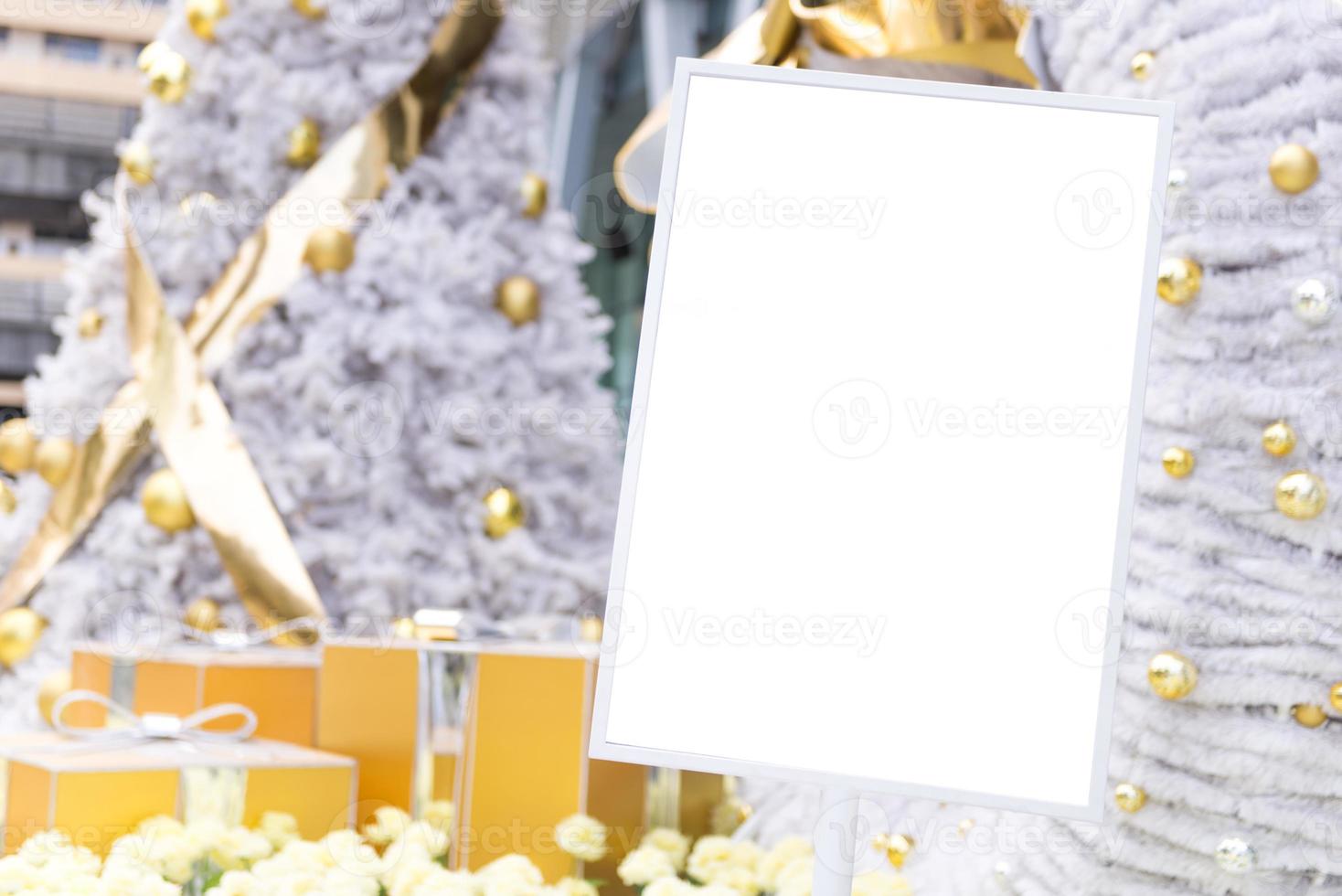 Empty board with Christmas tree, decorations and lights photo