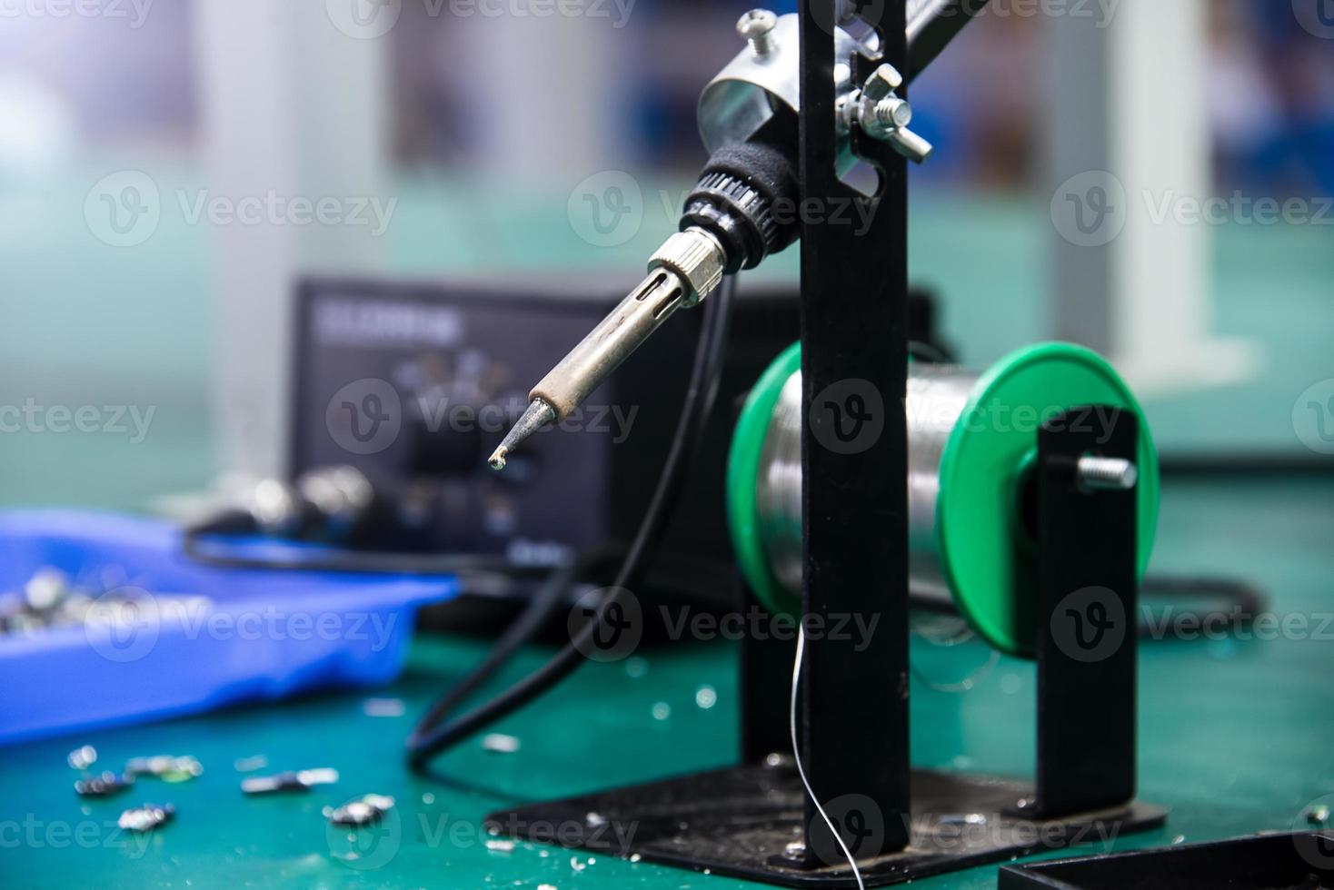 soldering iron and tin string photo