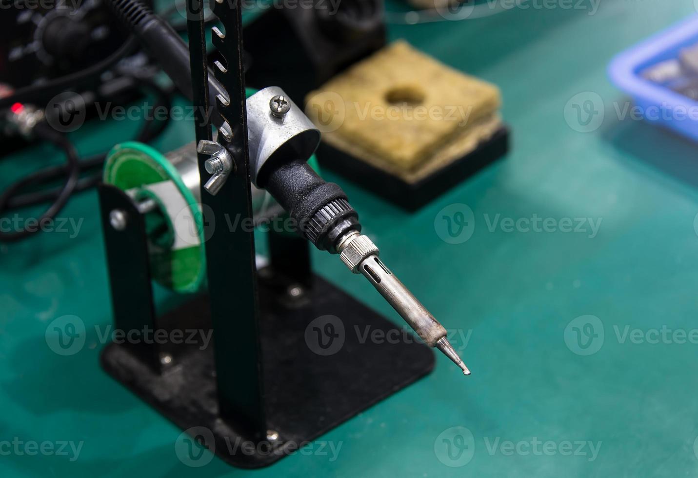 soldering iron and tin string photo