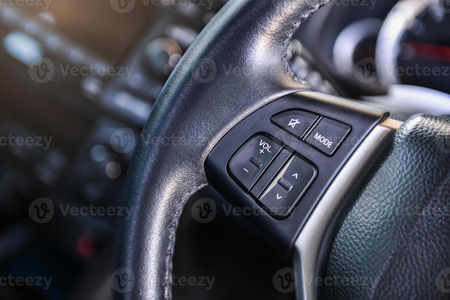 Audio control buttons on the steering wheel photo