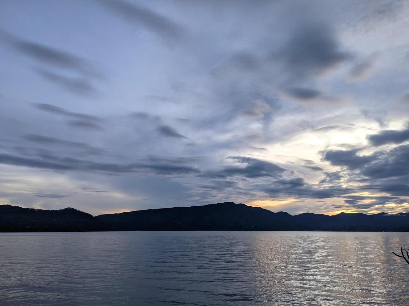 the beauty of the morning sky in lake toba photo