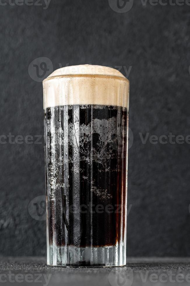Glass of black velvet cocktail photo
