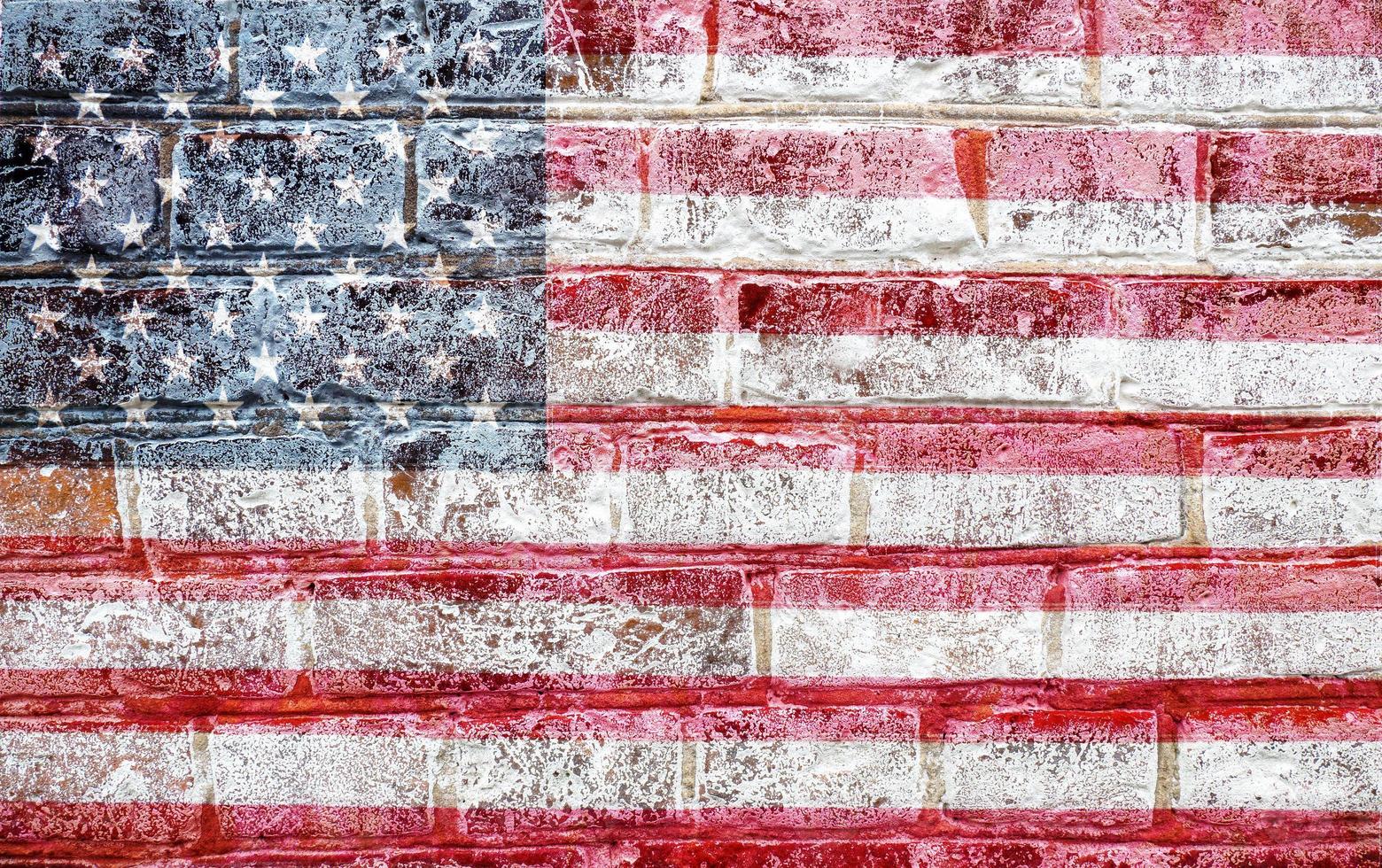 American flag of the USA on the old texture brick wall. Independence Day on July 4, Memorial Day and Veterans Day photo