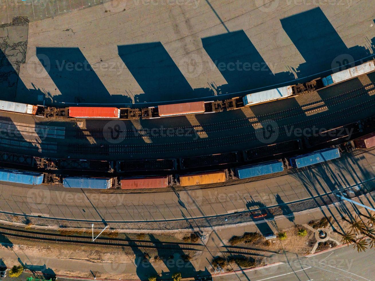 The Oakland Outer Harbor aerial view. Loaded trucks moving by Container cranes. photo