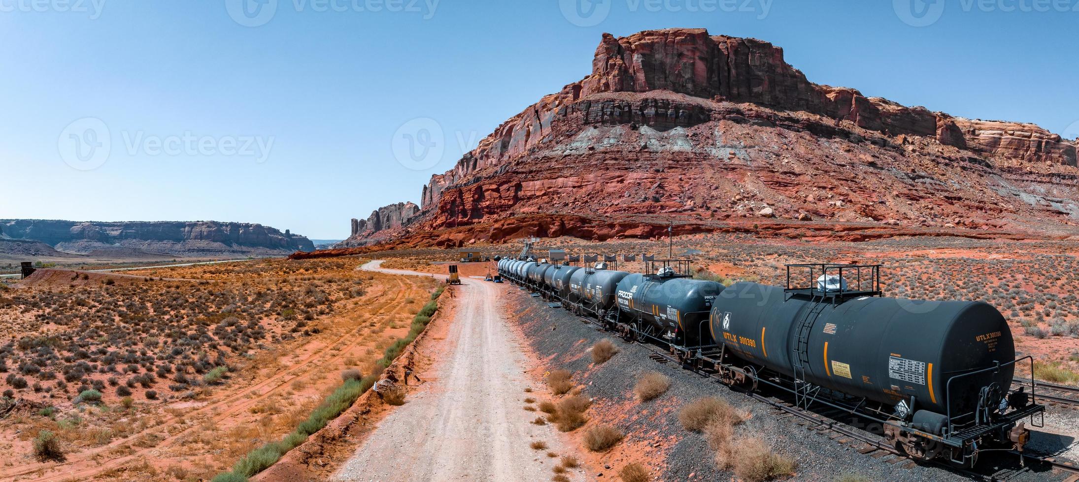 Aerial view of the cargo locomotive railroad engine crossing Arizona desert photo