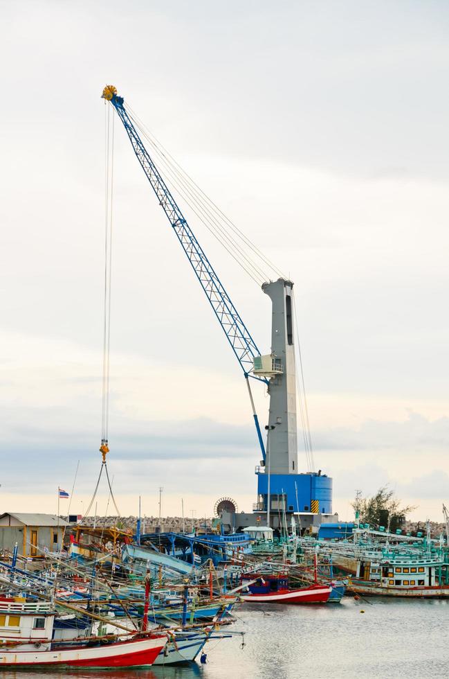 Harbor crane on the sea photo