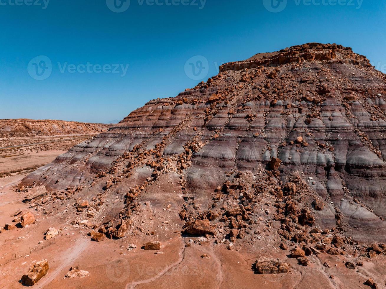 Endless desert view of Arizona, USA. Red rocks, no life for miles. photo