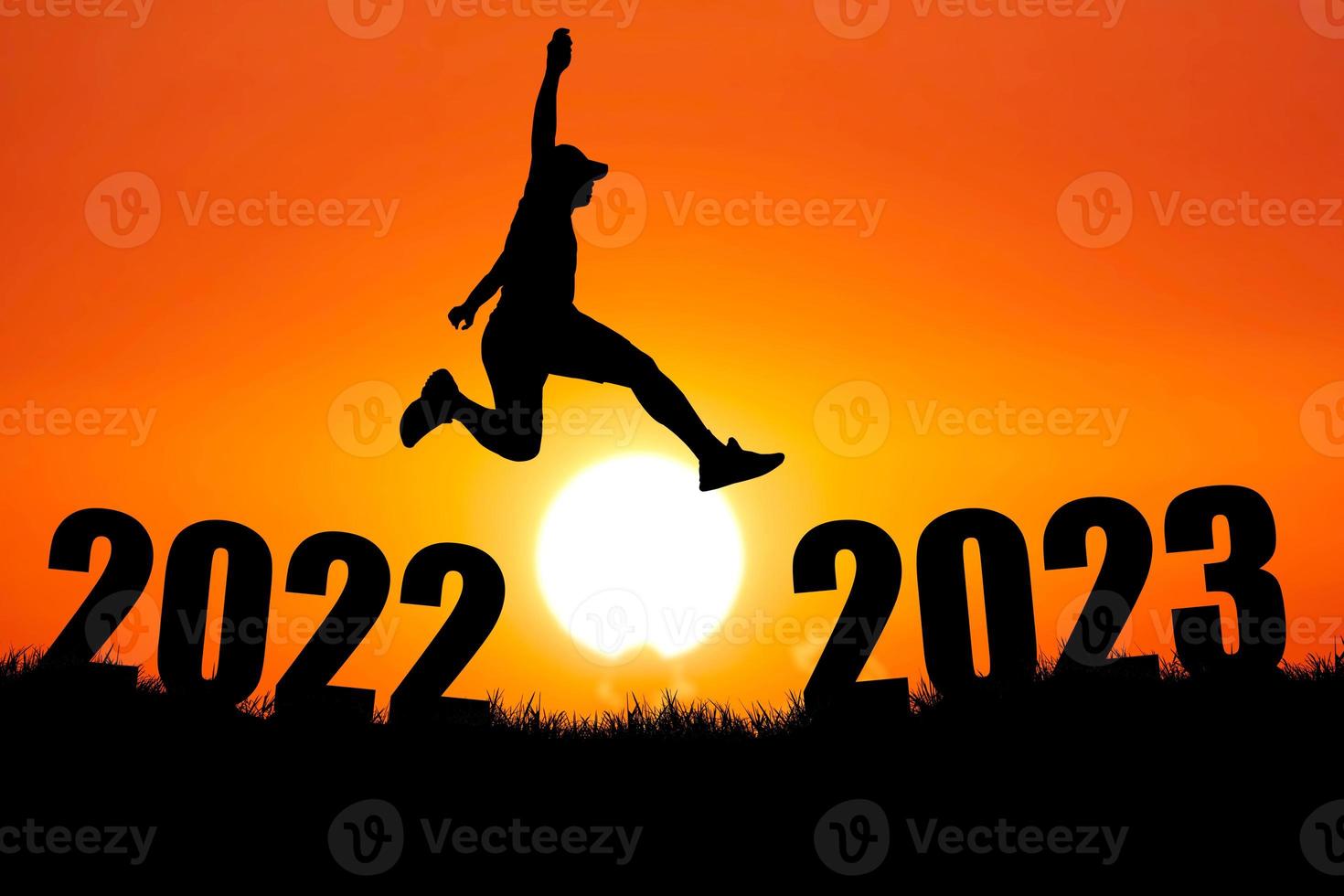 Silhouette of a man jumping. The concept of skipping, passing, moving forward. photo