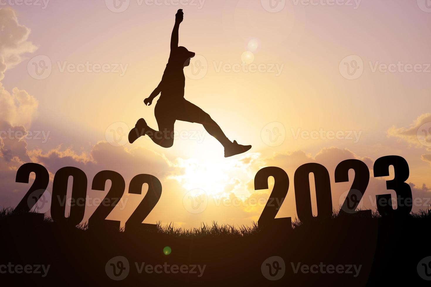 Silhouette of a man jumping. The concept of skipping, passing, moving forward. photo