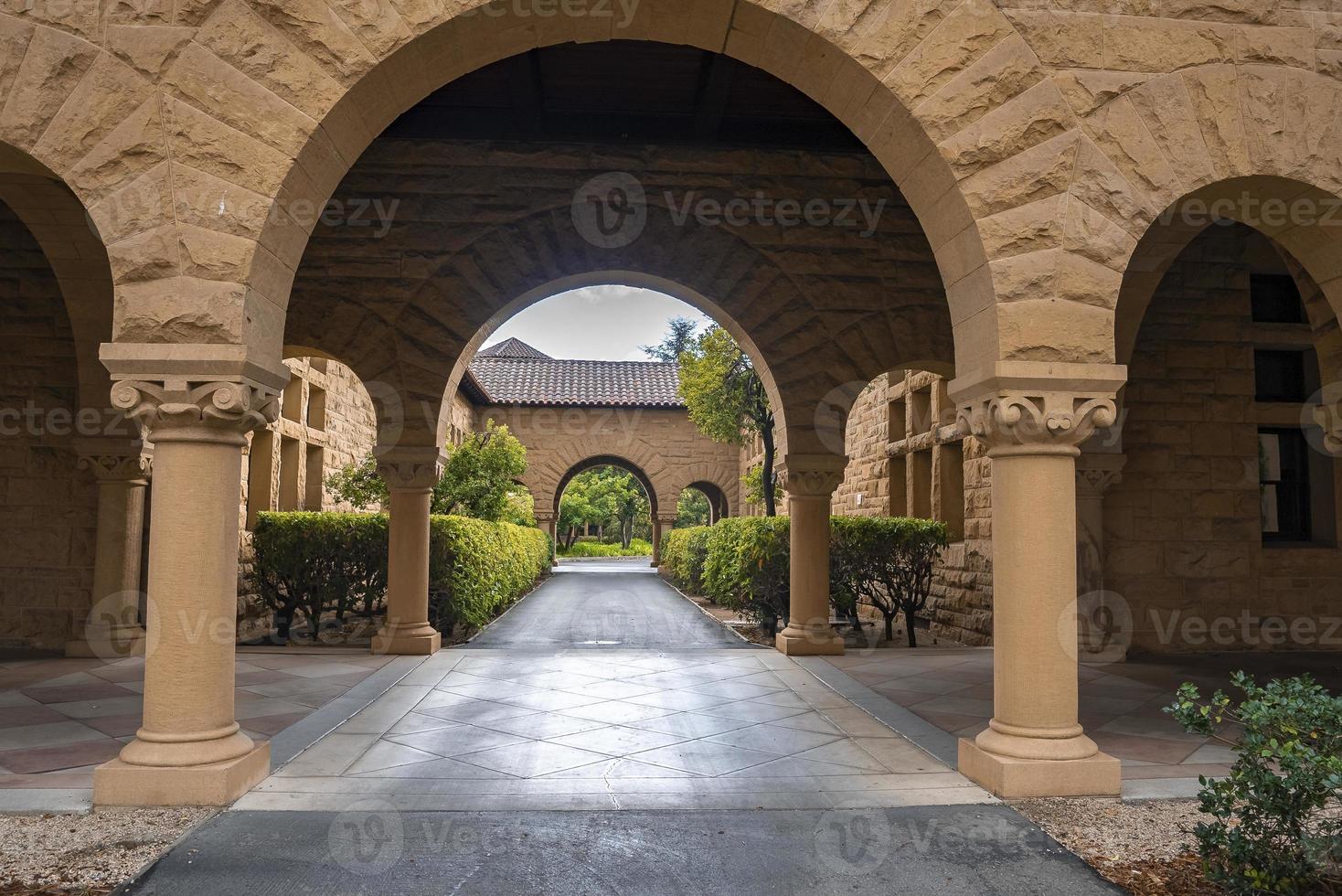 Diminishing perspective of empty archway at Stanford University photo