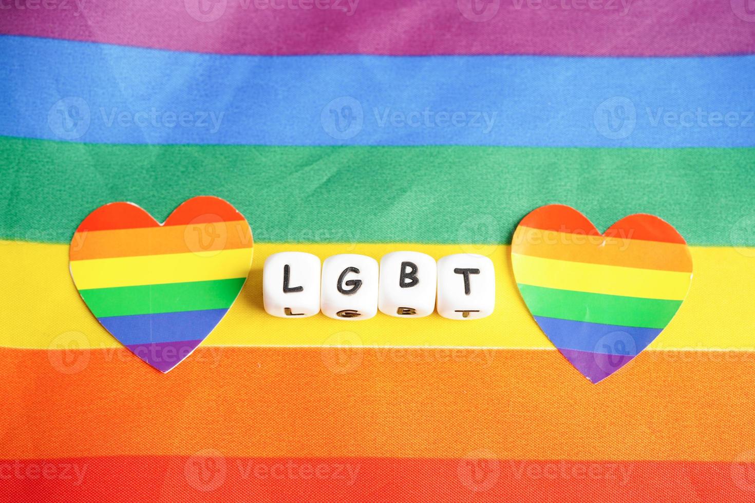 LGBT text character with rainbow flag heart for symbol of pride month lesbian, gay, bisexual, transgender, human rights, tolerance and peace. photo