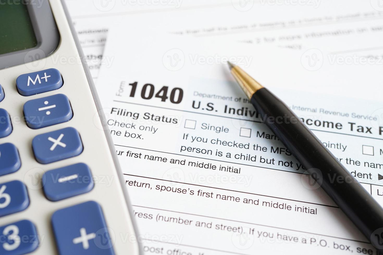 Tax form 1040 U.S. Individual Income Tax Return, business finance concept. photo