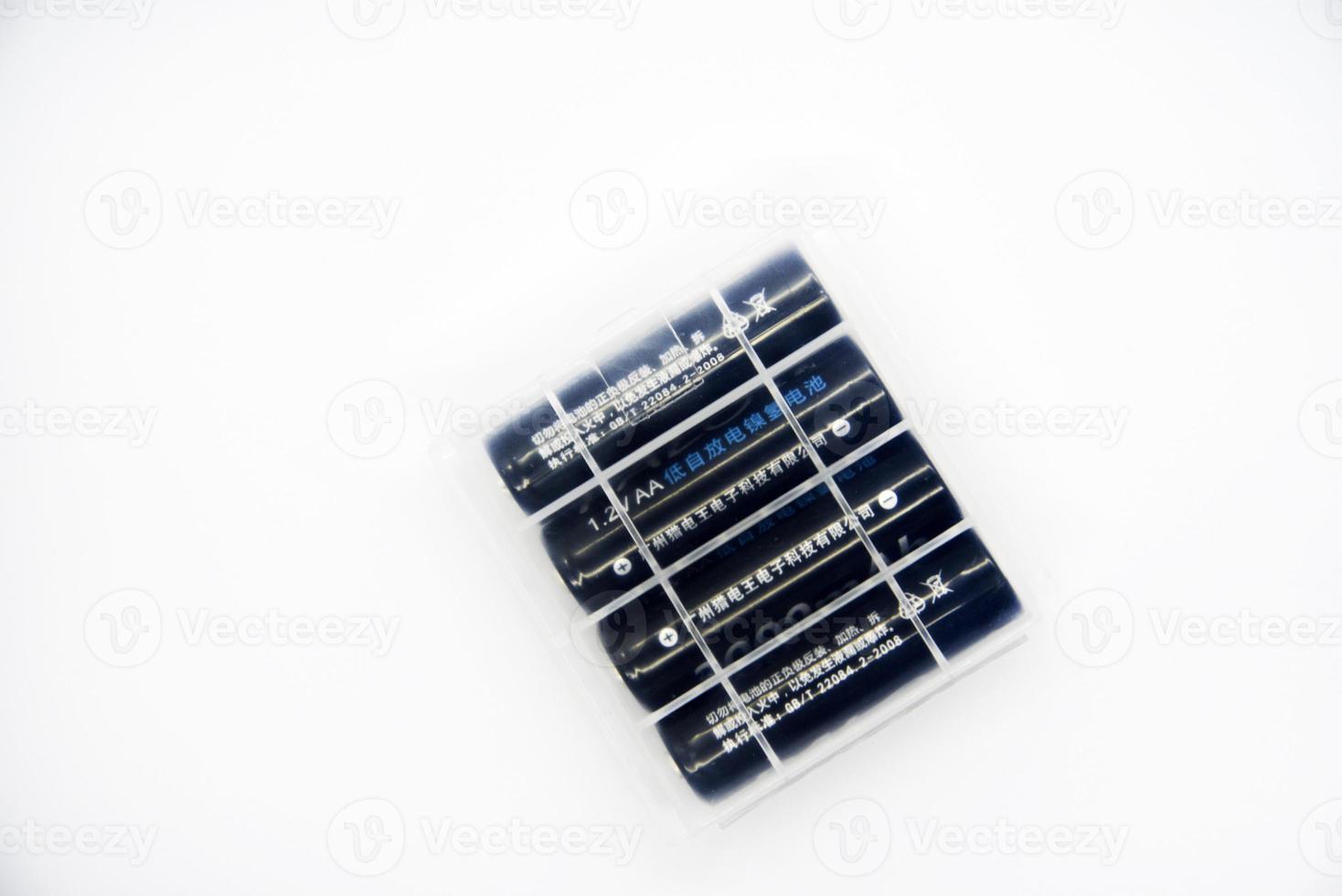 Rechargeable batteries in plastic packaging on a white background. Household batteries for appliances. photo