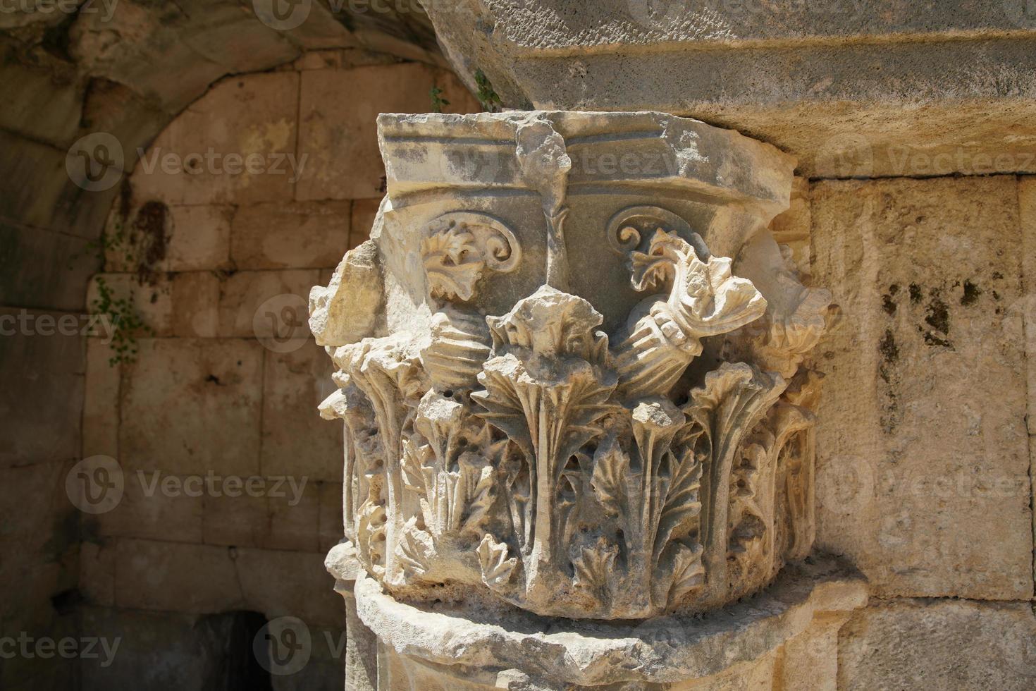 Column Head in Theatre of Perge Ancient City in Antalya, Turkiye photo