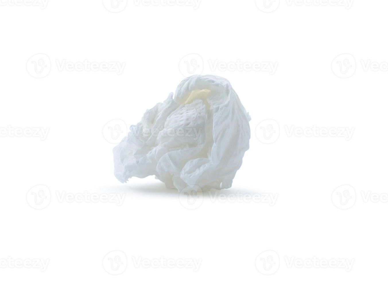 Single screwed or crumpled tissue paper after use isolated on white background with clipping path photo