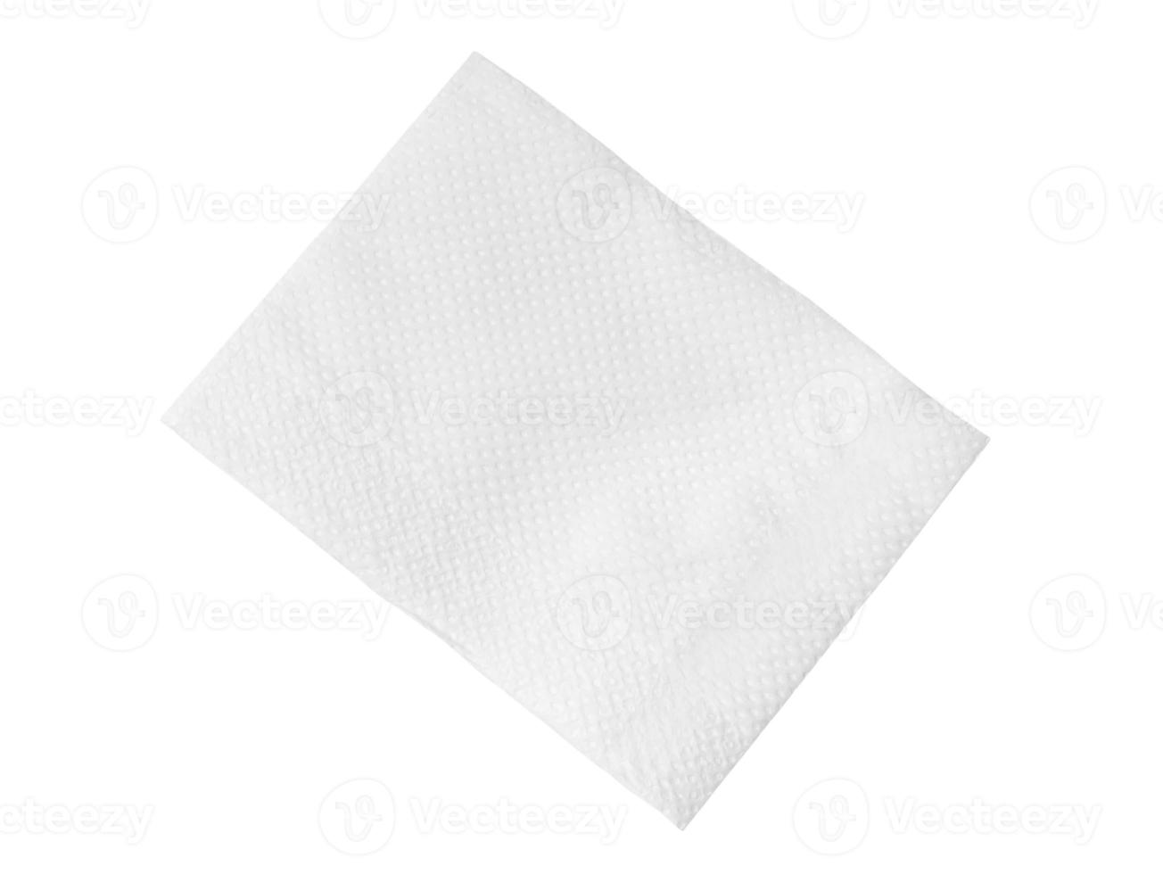 Top view of single folded white tissue paper or napkin isolated on white background with clipping path photo