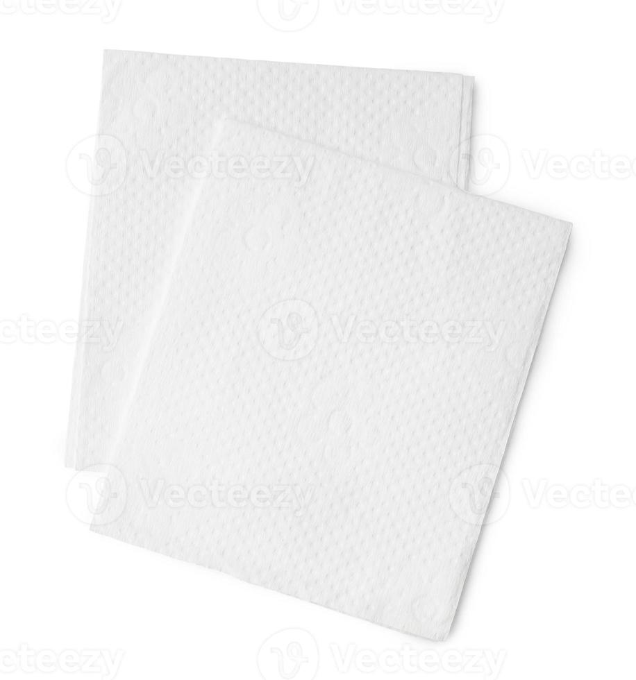 Two folded pieces of white tissue paper or napkin in stack isolated on white background with clipping path photo