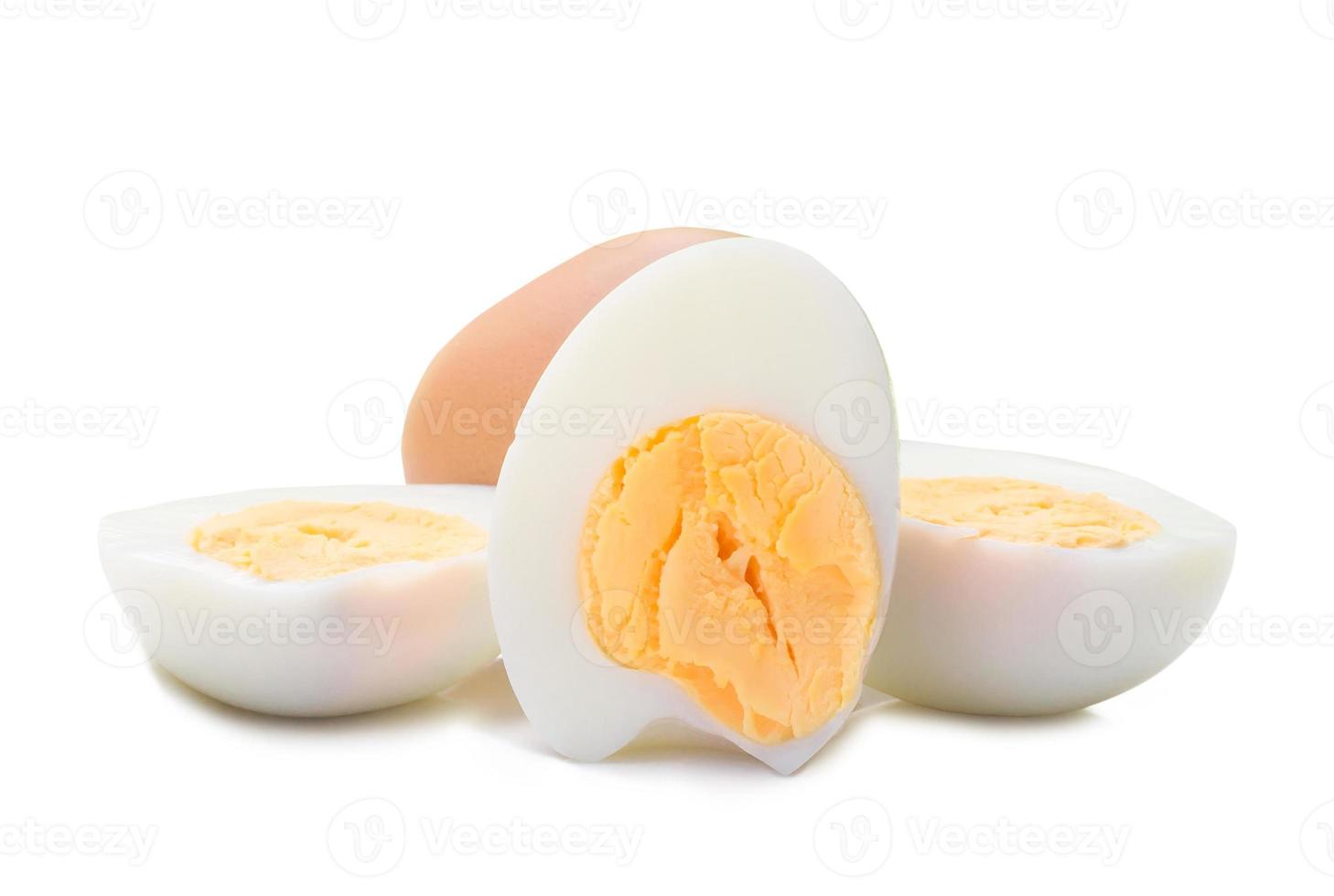 Close up of boiled chicken egg with peeled halves isolated on white background with clipping path, Selective focus photo