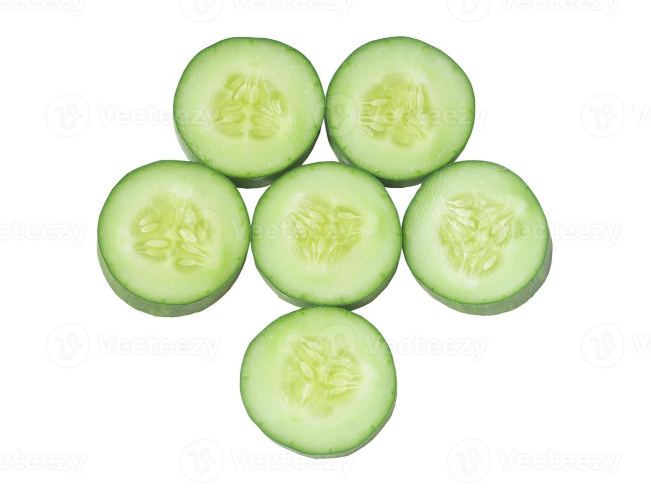 Top view of fresh cucumber slices isolated on white background with clipping path photo