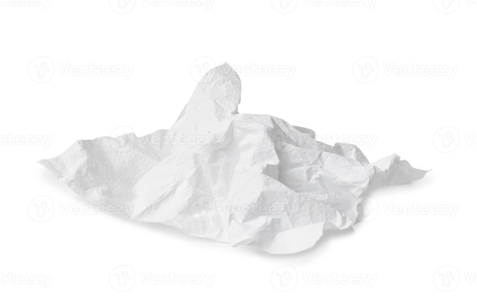 Single screwed or crumpled tissue paper after use isolated on white background with clipping path photo