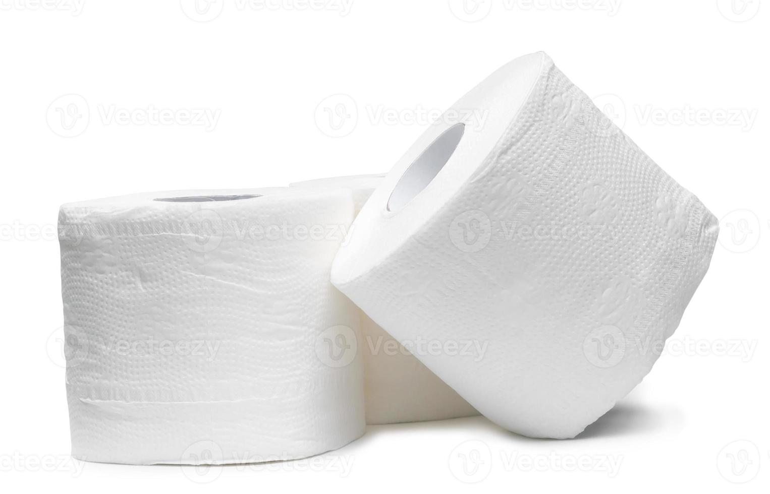 three rolls of white tissue paper or napkin prepared for use in toilet or restroom isolated on white background with clipping path photo