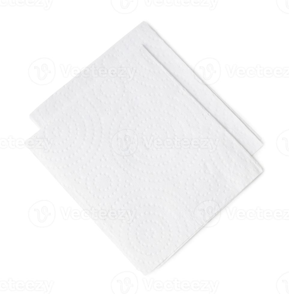 Two folded pieces of white tissue paper or napkin for use in toilet or restroom in stack isolated on white background with clipping path photo