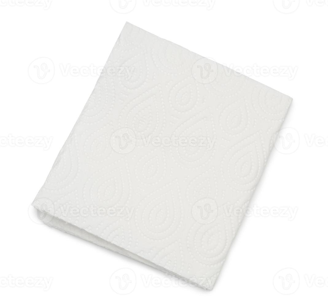 One folded piece of white tissue paper or napkin isolated on white background with clipping path, Top view of tissue paper photo