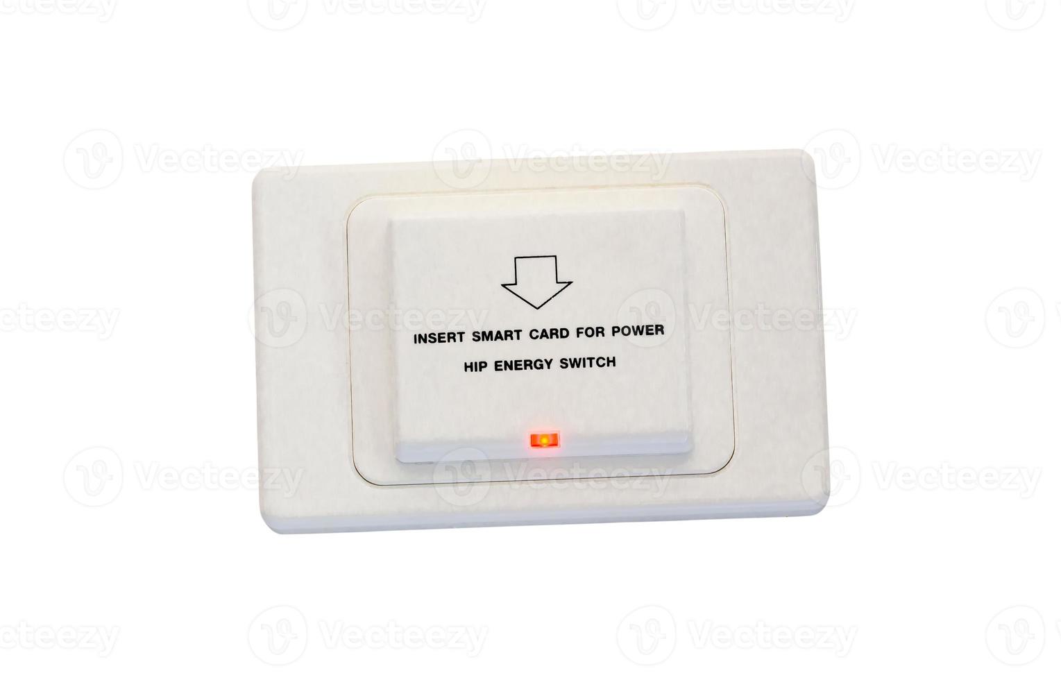 White socket with text reading Insert smart card for power installed on wall in luxurious hotel or resort room isolated on white background with clipping path photo