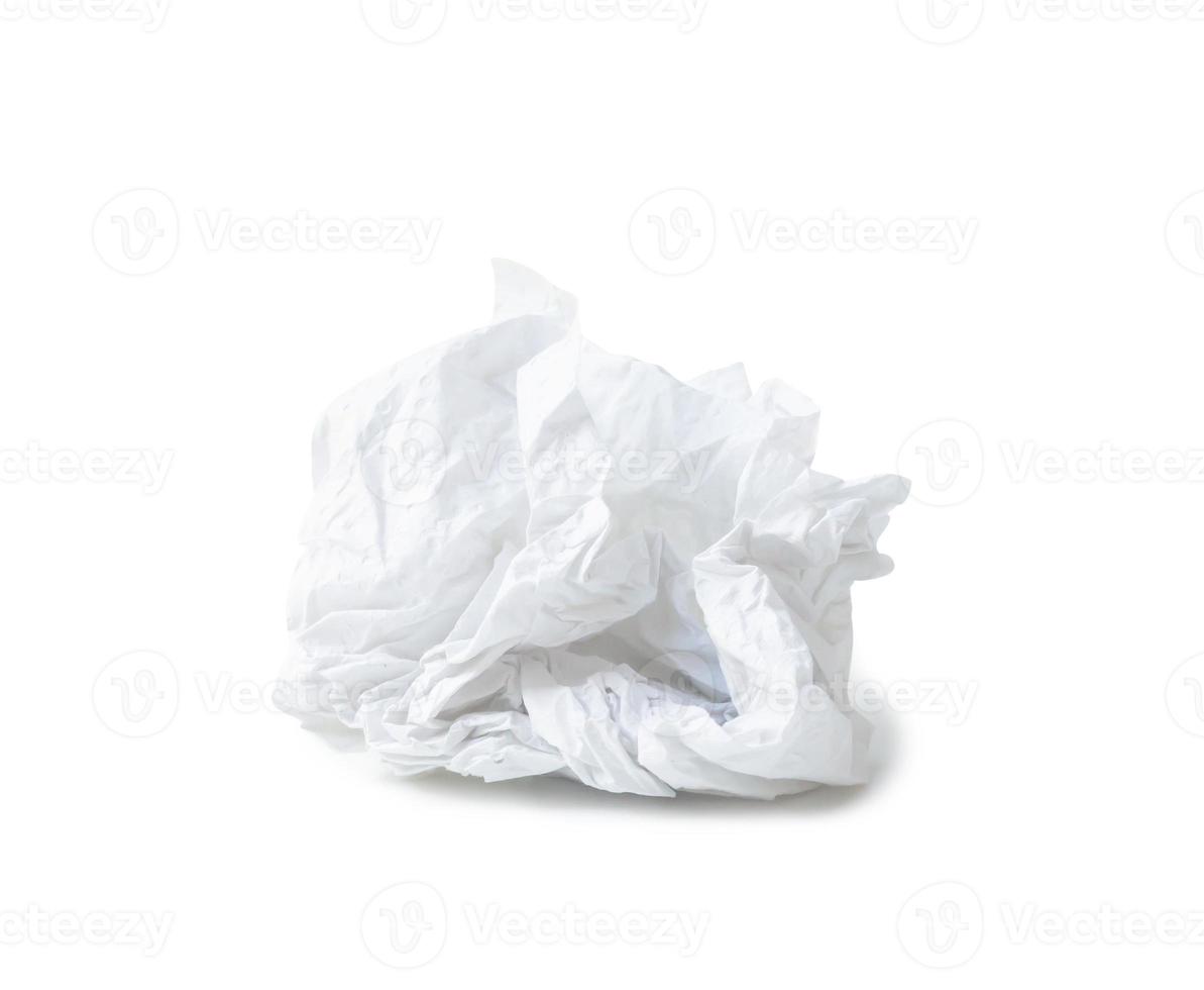 Single screwed or crumpled tissue paper or napkin in ball shape after use isolated on white background with clipping path photo