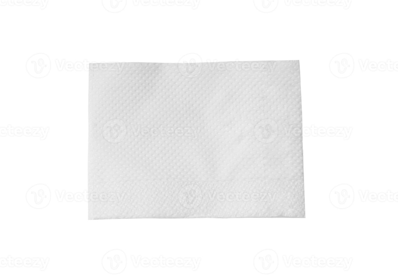 Top view of single folded white tissue paper or napkin isolated on white background photo