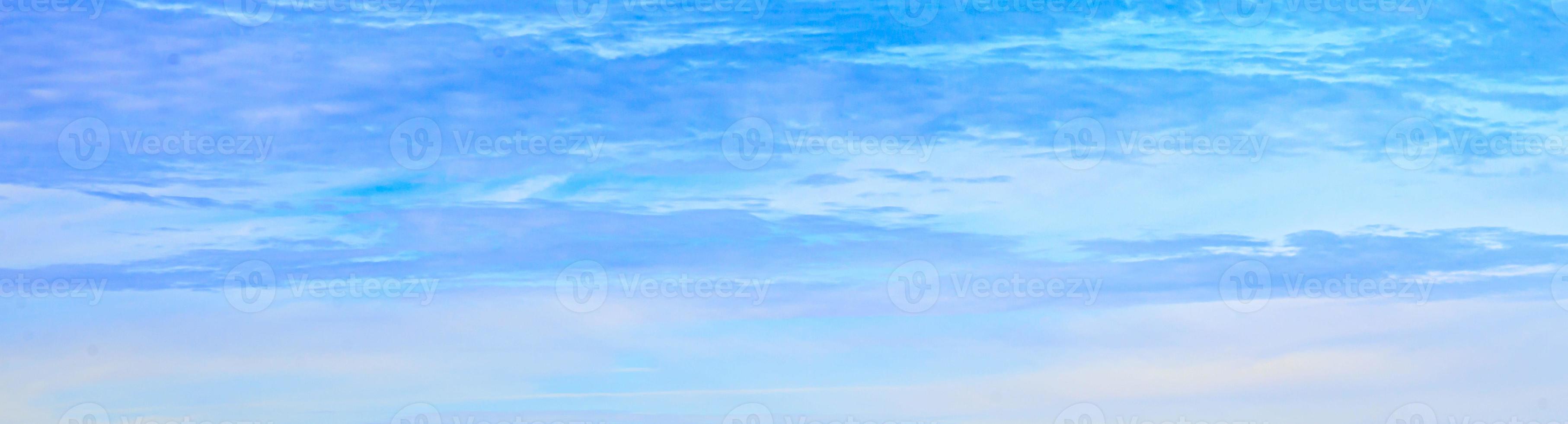 Image of a partly cloudy and partly clear sky during the day photo