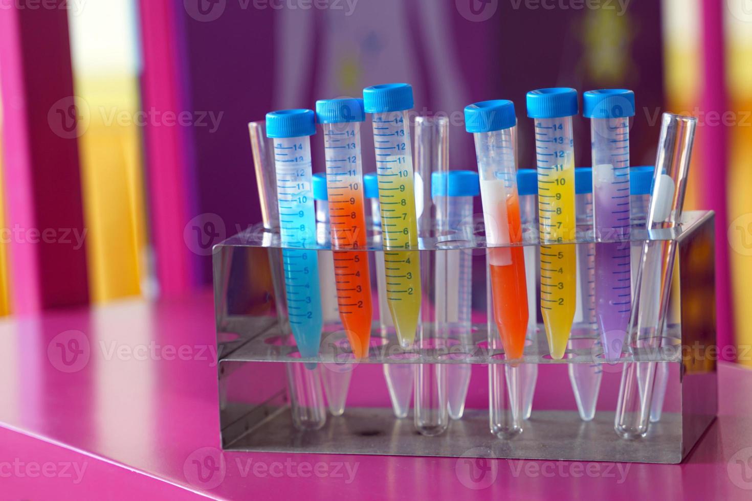 a solution in a scientific test tube Set up to observe, record results, and summarize experimental results. Soft and selective focus. photo