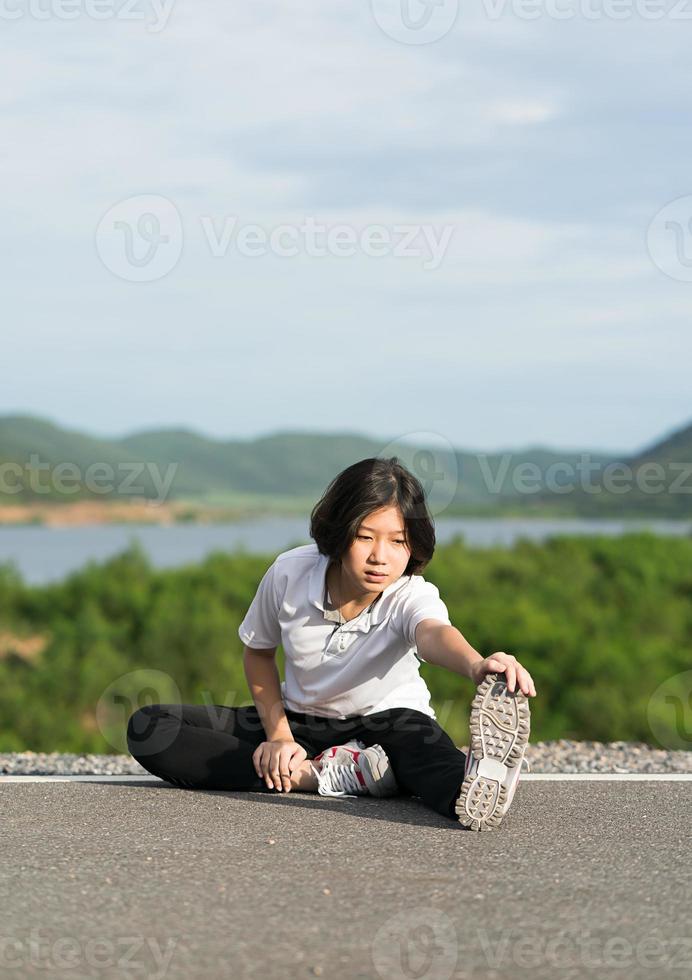 Woman preparing for jogging outdoor photo