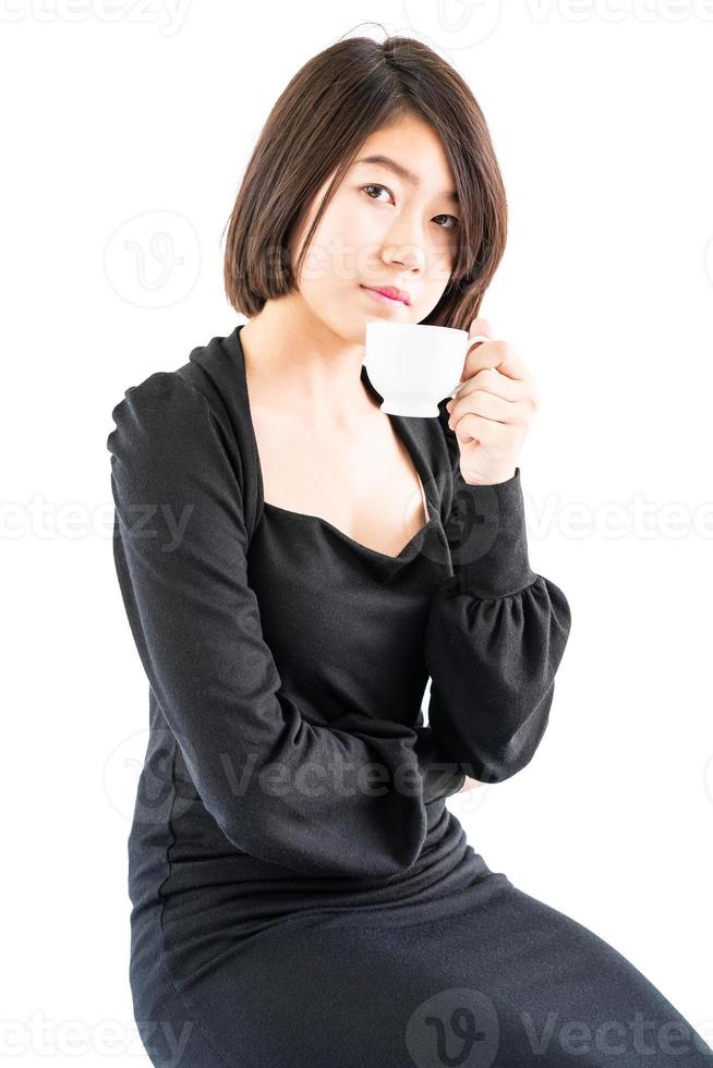 Woman holding coffee cup isolated on white photo