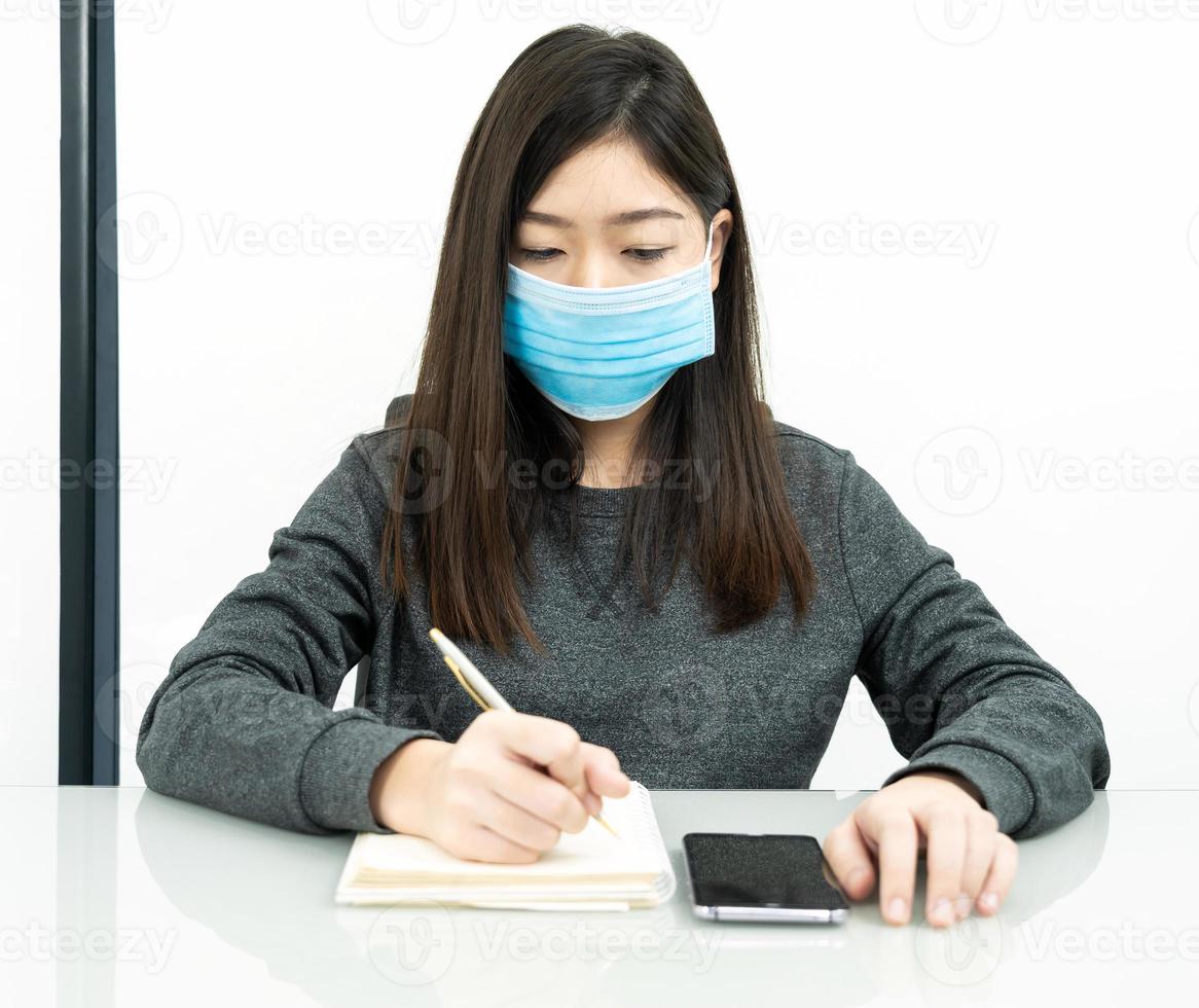 Teenage female student preparing for learnning at home photo