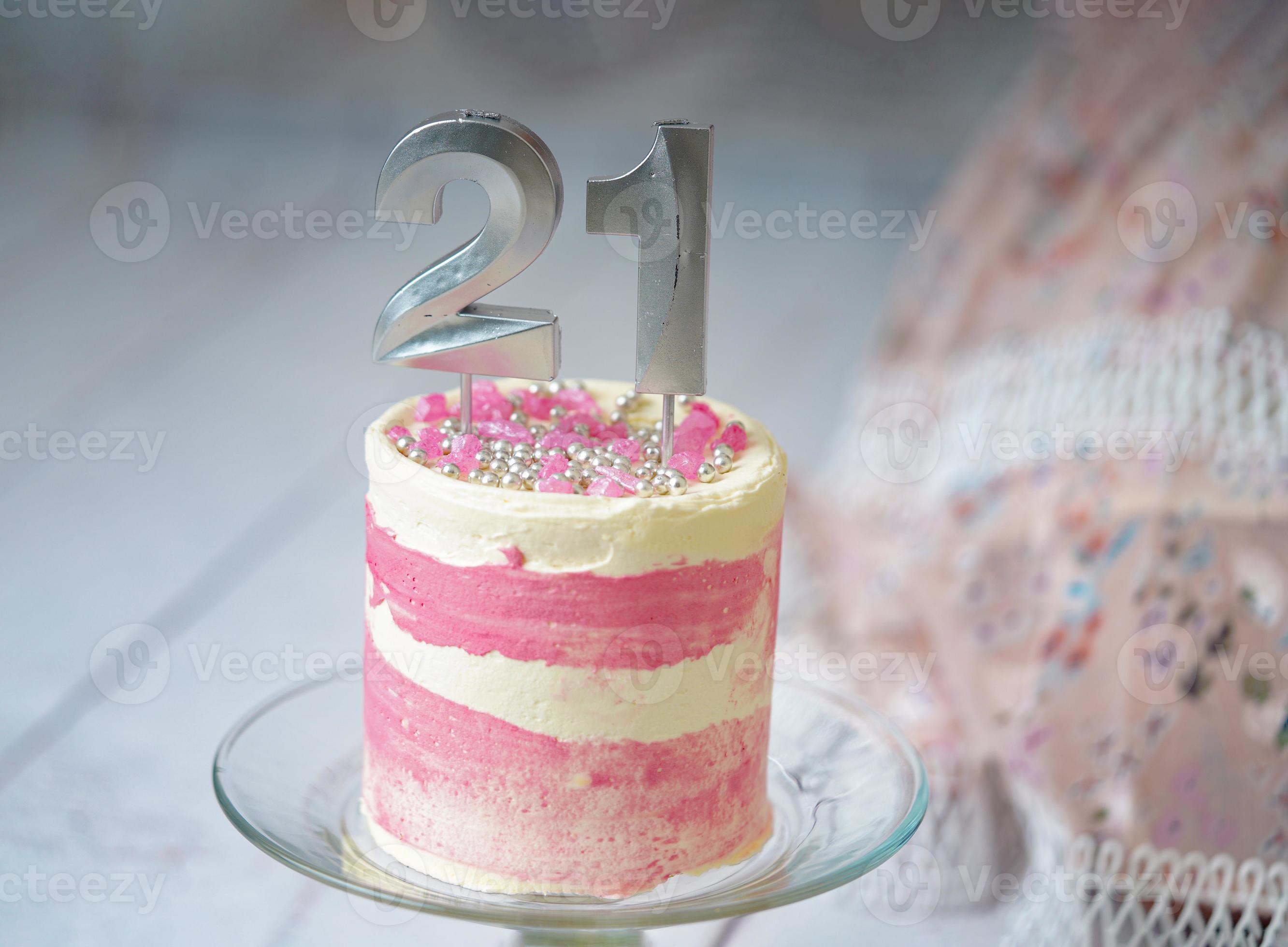 21st Birthday cake pink and silver cake with some sprinkles