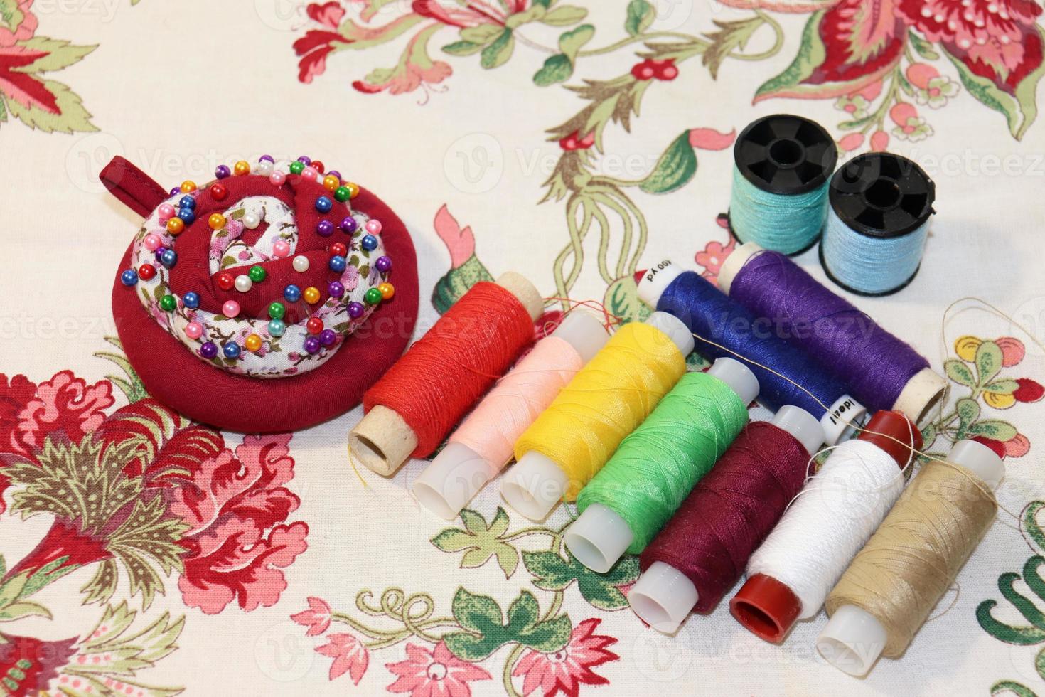 pins and thread for sewing photo