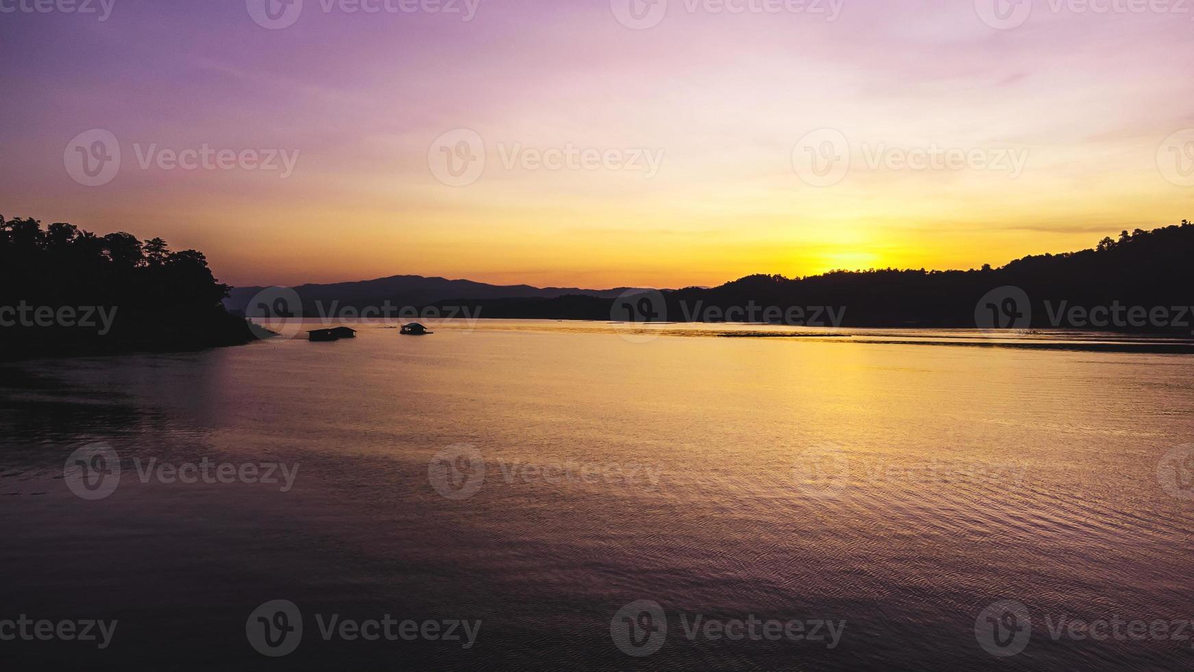 Aerial view of landscape sunset with Reservoir and raft house Thailand photo