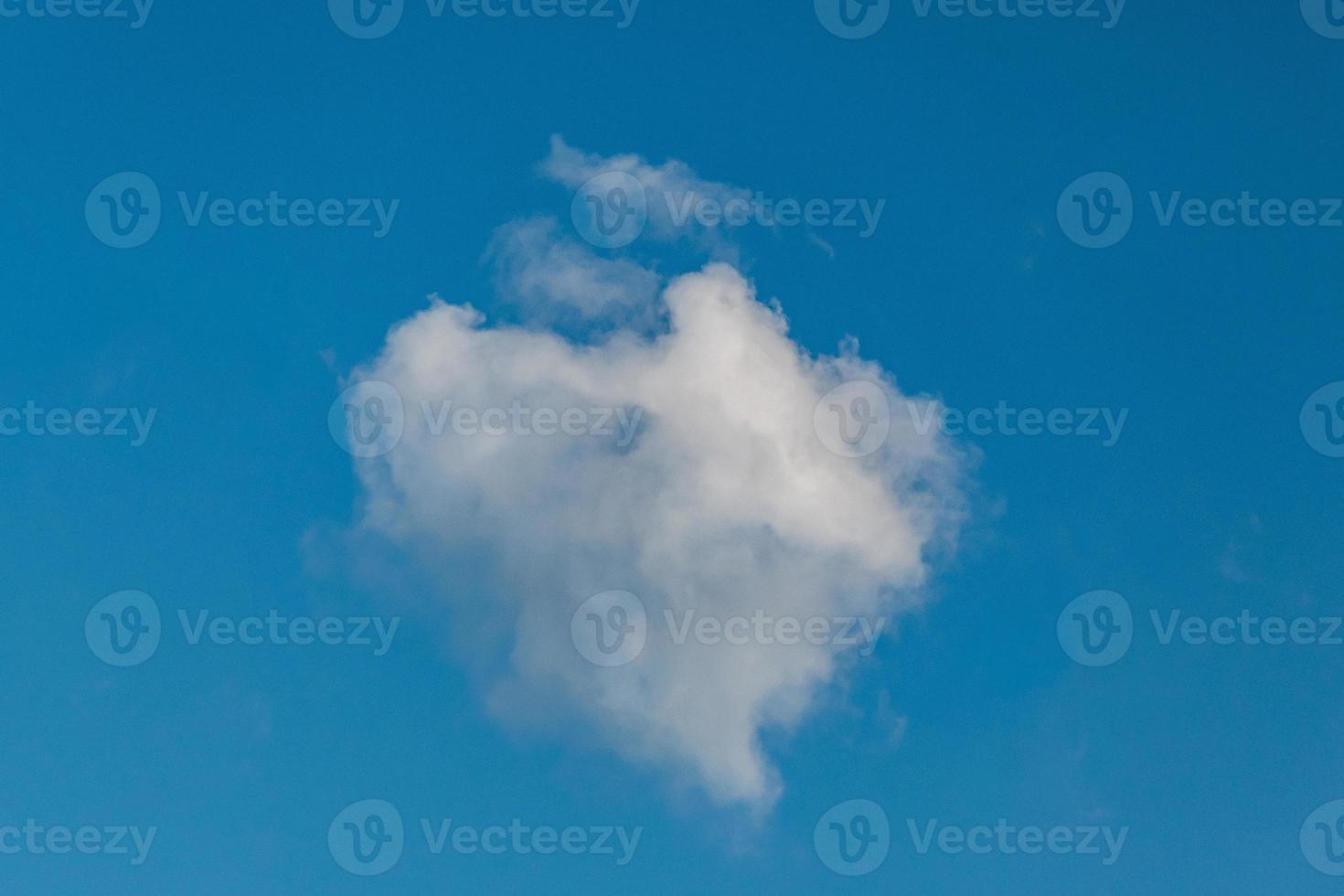 white clouds on blue sky photo