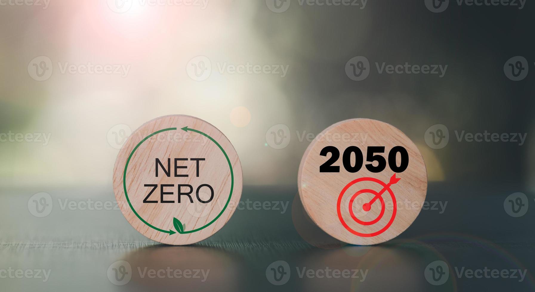 wooden blocks on the table,Net Zero and Carbon Neutral Concepts, a businessman in charge of green renewable energy technologies,save world,global warming campaign, green energy photo